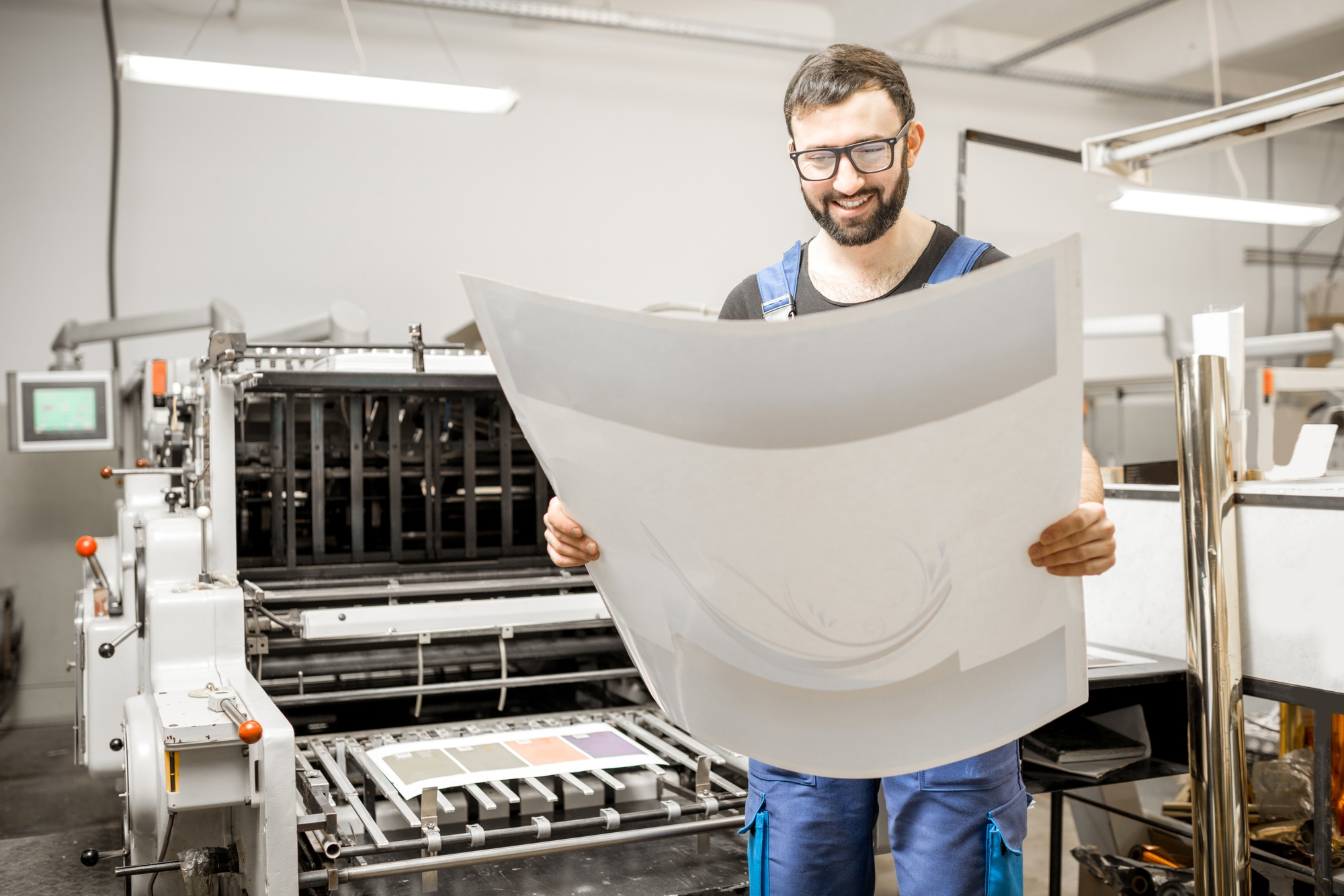 Checking printing quality at the printing plant Checking printing quality at the printing plant
