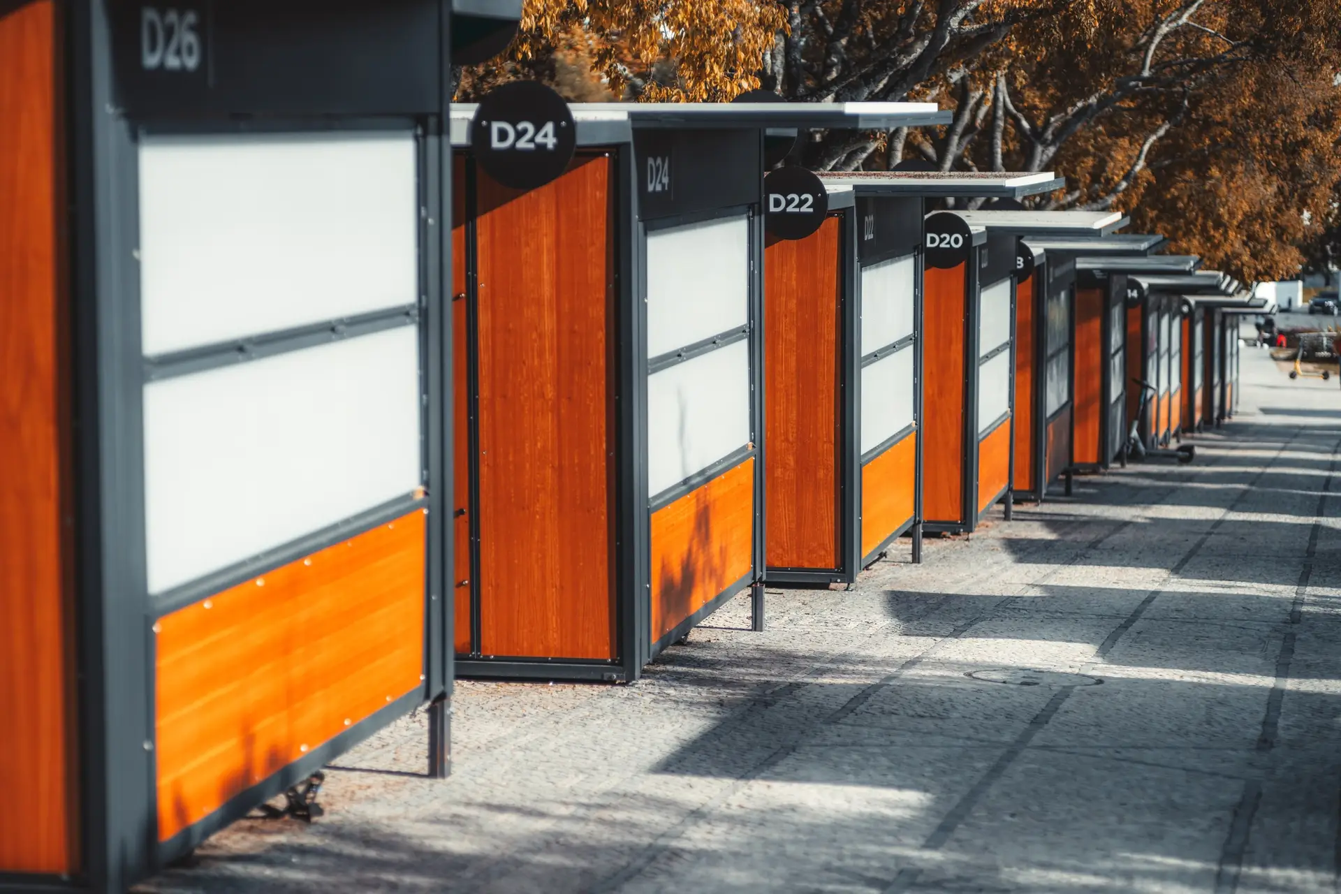 Several closed kiosks in a row Several closed kiosks in a row